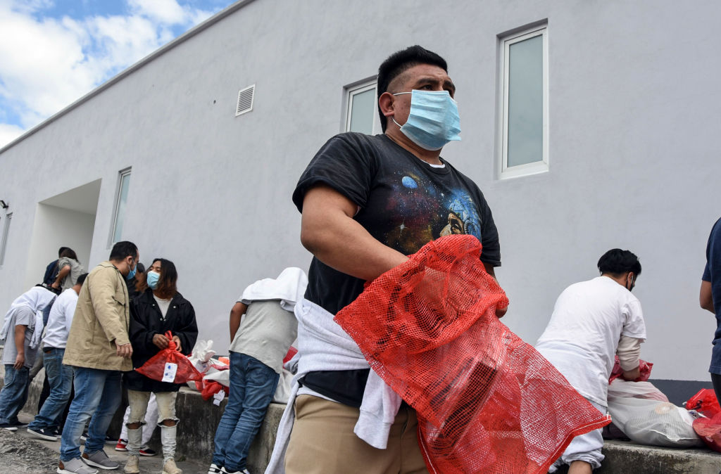 Migrantes de Guatemala en el aeropuerto de su país