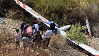 Planeador cae con aeronave en la ribera del río Mapocho en Vitacura