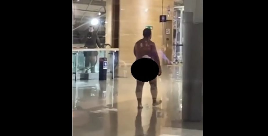 Al desnudo! Hombre camina sin ropa en el Aeropuerto de Punta Arenas